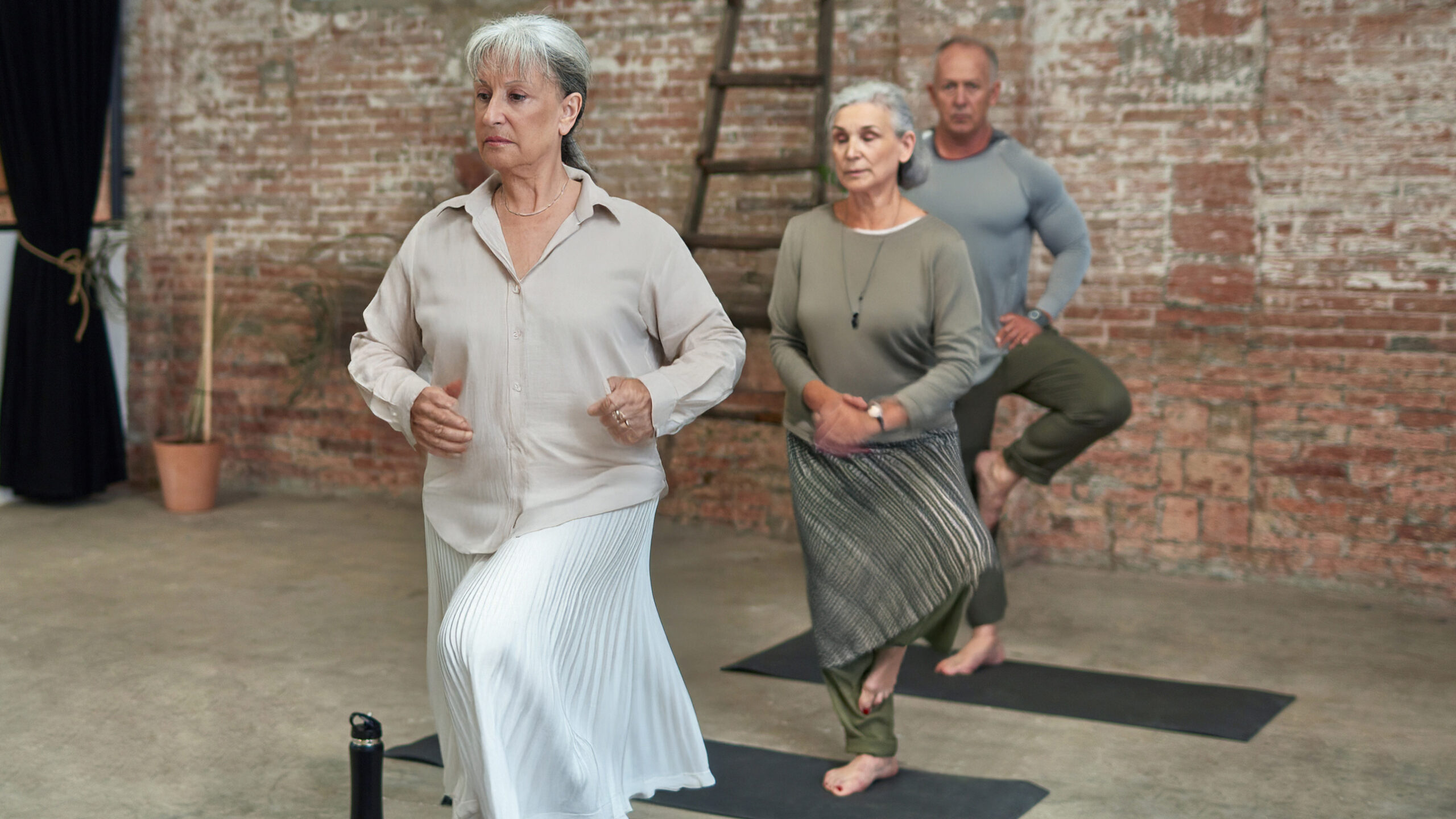 group doing balancing movement